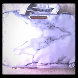 Hanging Aimee Kestenberg makeup bag